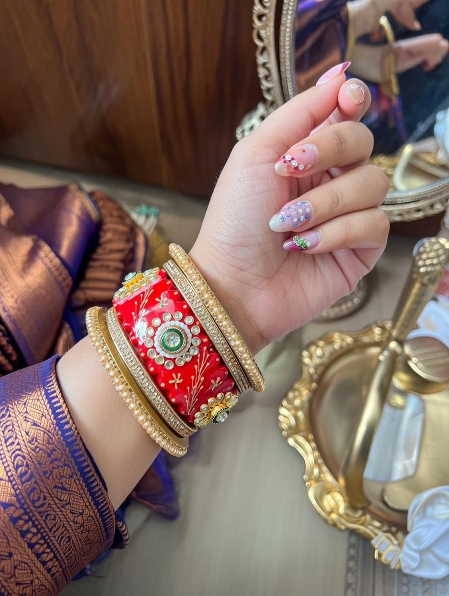 "Handcrafted red lac churi set for weddings and festivals"