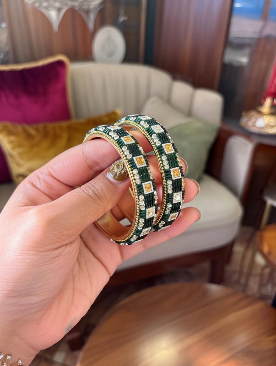 "Dark green lac bangles with traditional mirror work for Indian weddings"