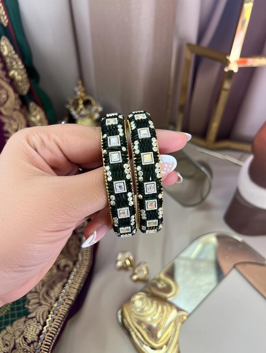 "Dark green lac bangles with traditional mirror work for Indian weddings"