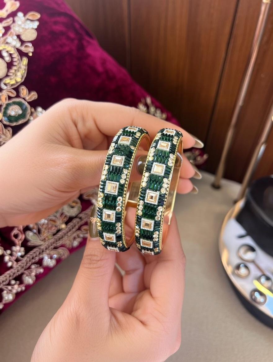 "Dark green lac bangles with traditional mirror work for Indian weddings"