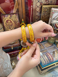 "Handcrafted painted lac bangles perfect for bridal wear"