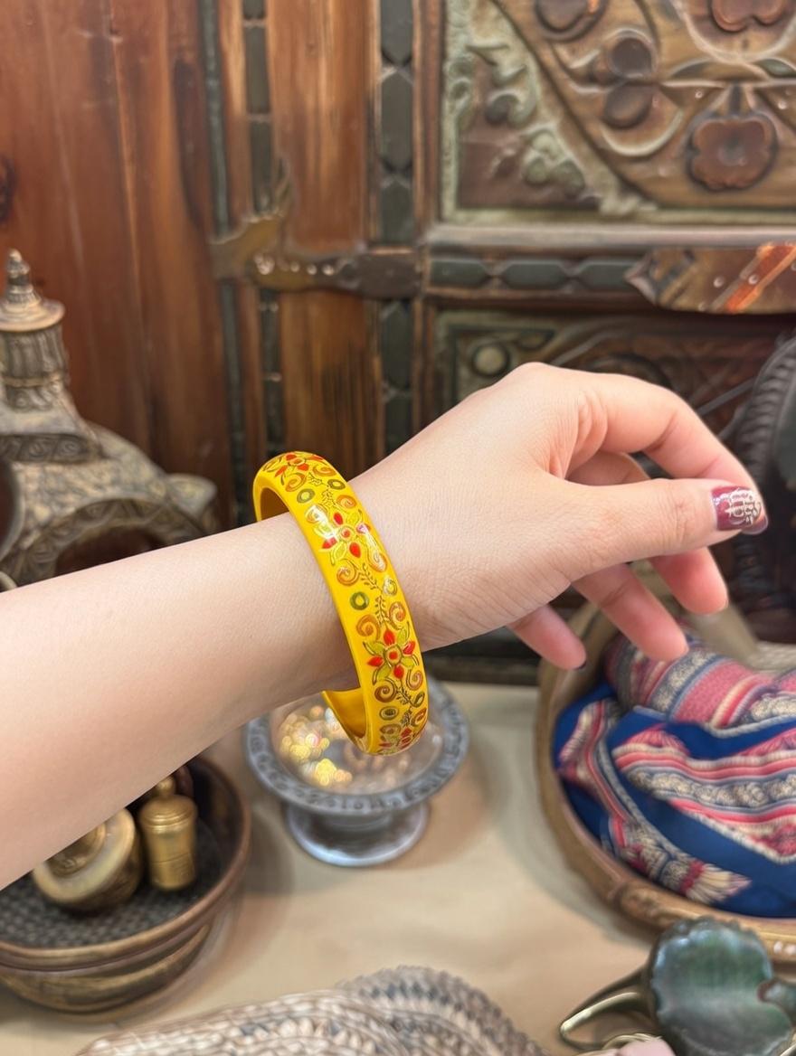 "Handcrafted painted lac bangles perfect for bridal wear"